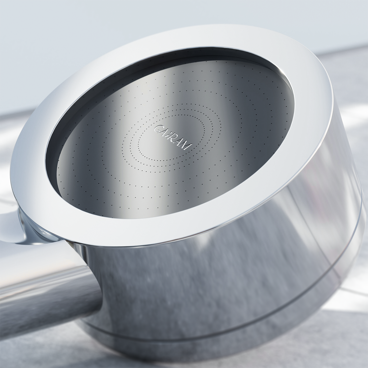 Close-up of the silver shower head, focusing on the face of the product