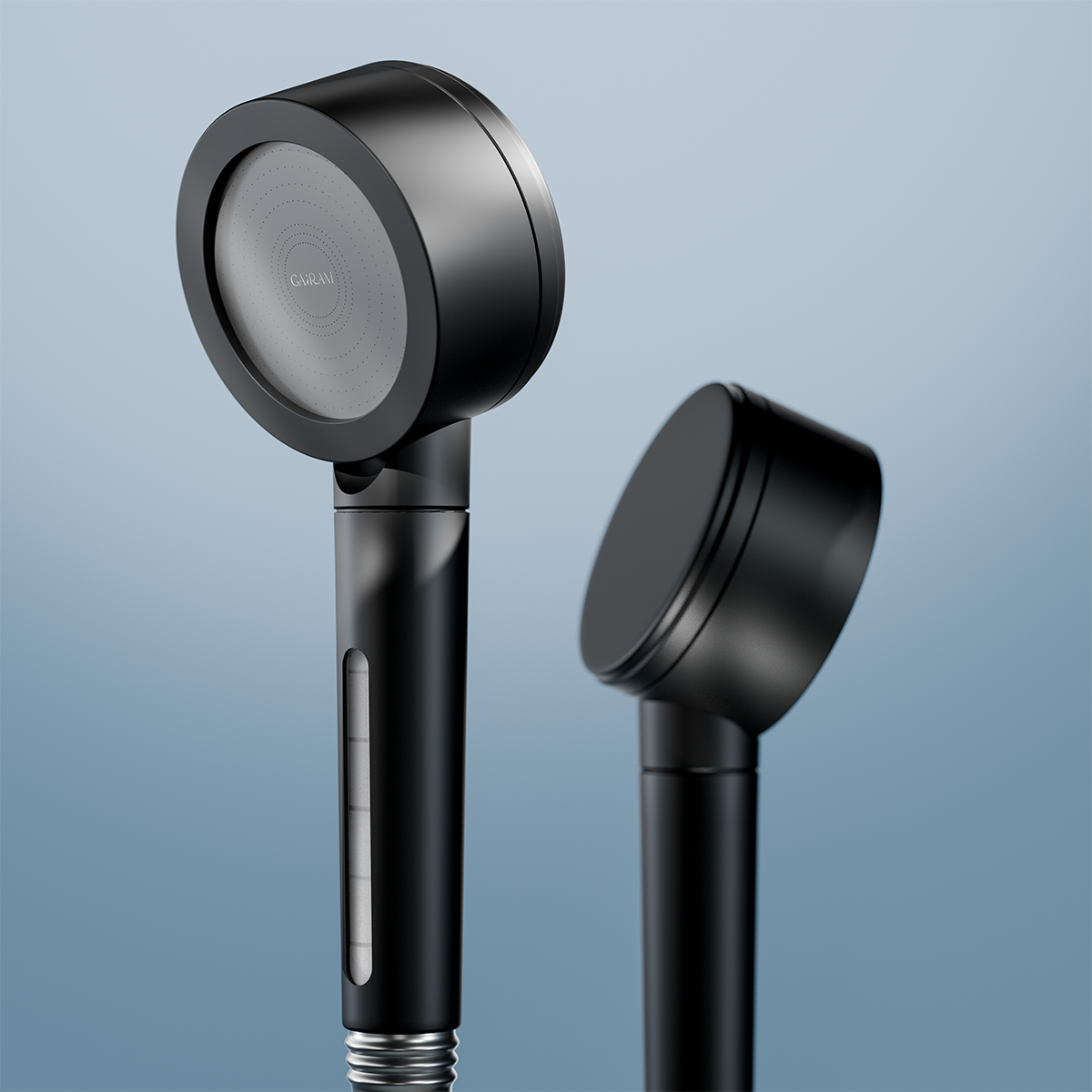 Matte black filtered shower head showing both front and back from a side angle